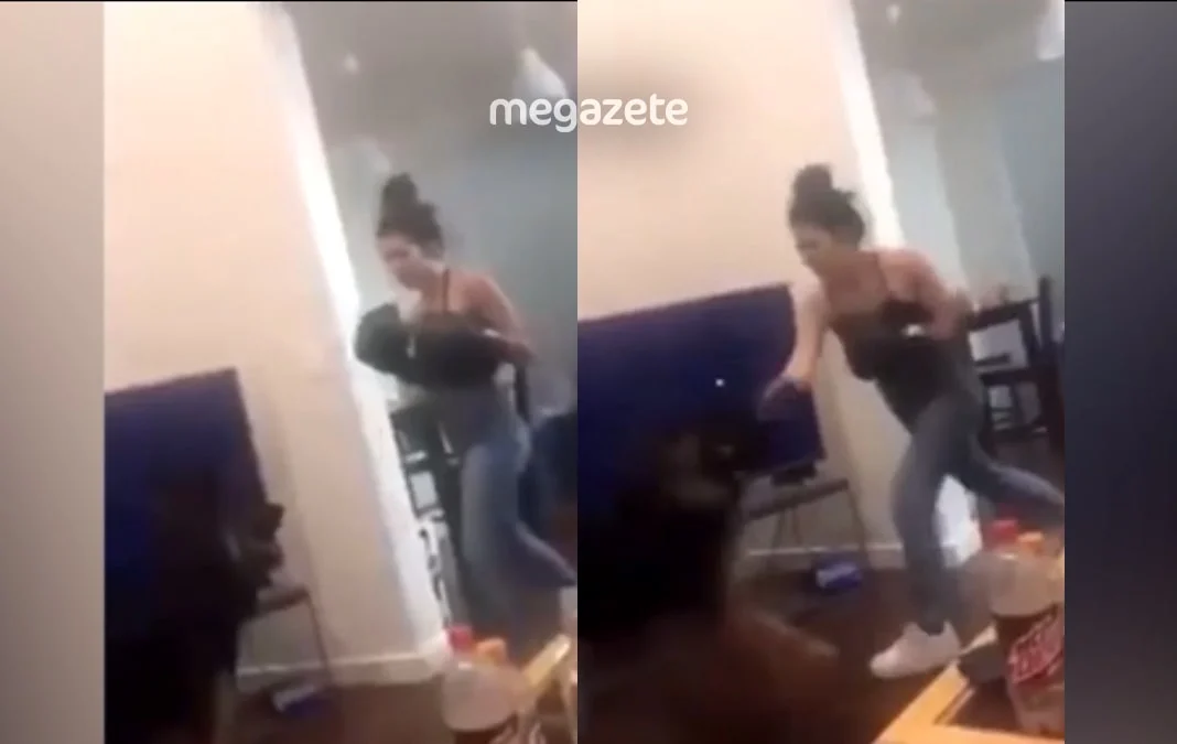 Köpeğini boks eldivenleriyle yumruklayan kadın!